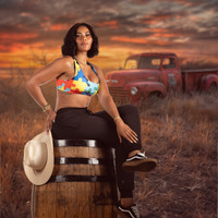 FEMALE ON BARRREL OLD TRUCK