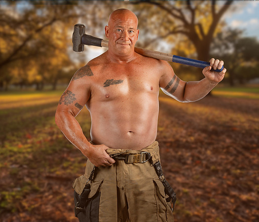 MALE WITH SLEDGEHAMMER IN HANGAR